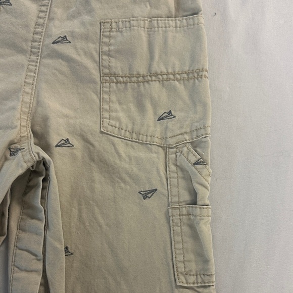 OshKosh B'gosh Kids Tan Overalls w/ embroidered paper airplane design - Picture 5 of 5